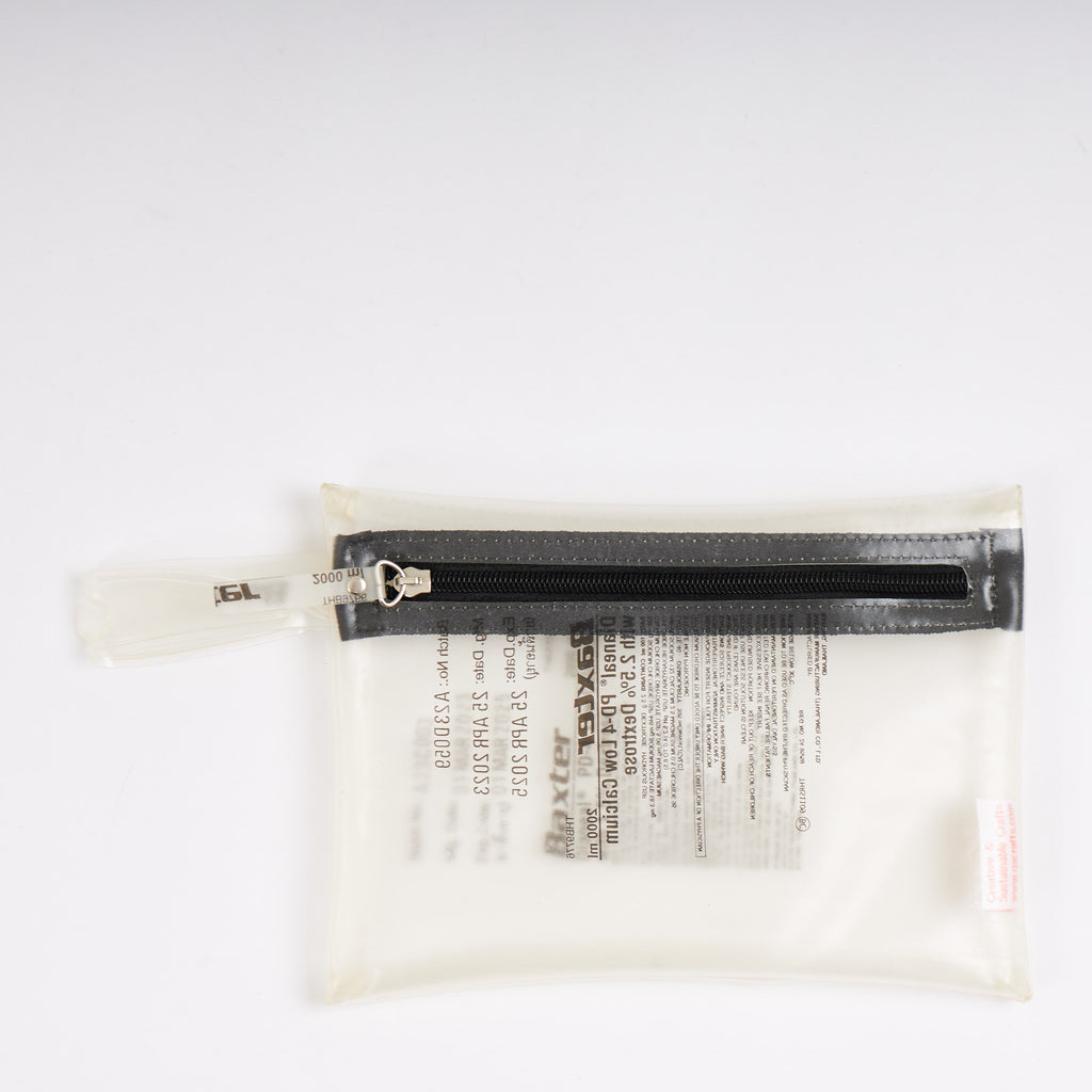 Sustainable handcraft and recycled pouch from Asia. The pouch is made of recycled dialysis bag and is sold online on www.qacrafts.com.