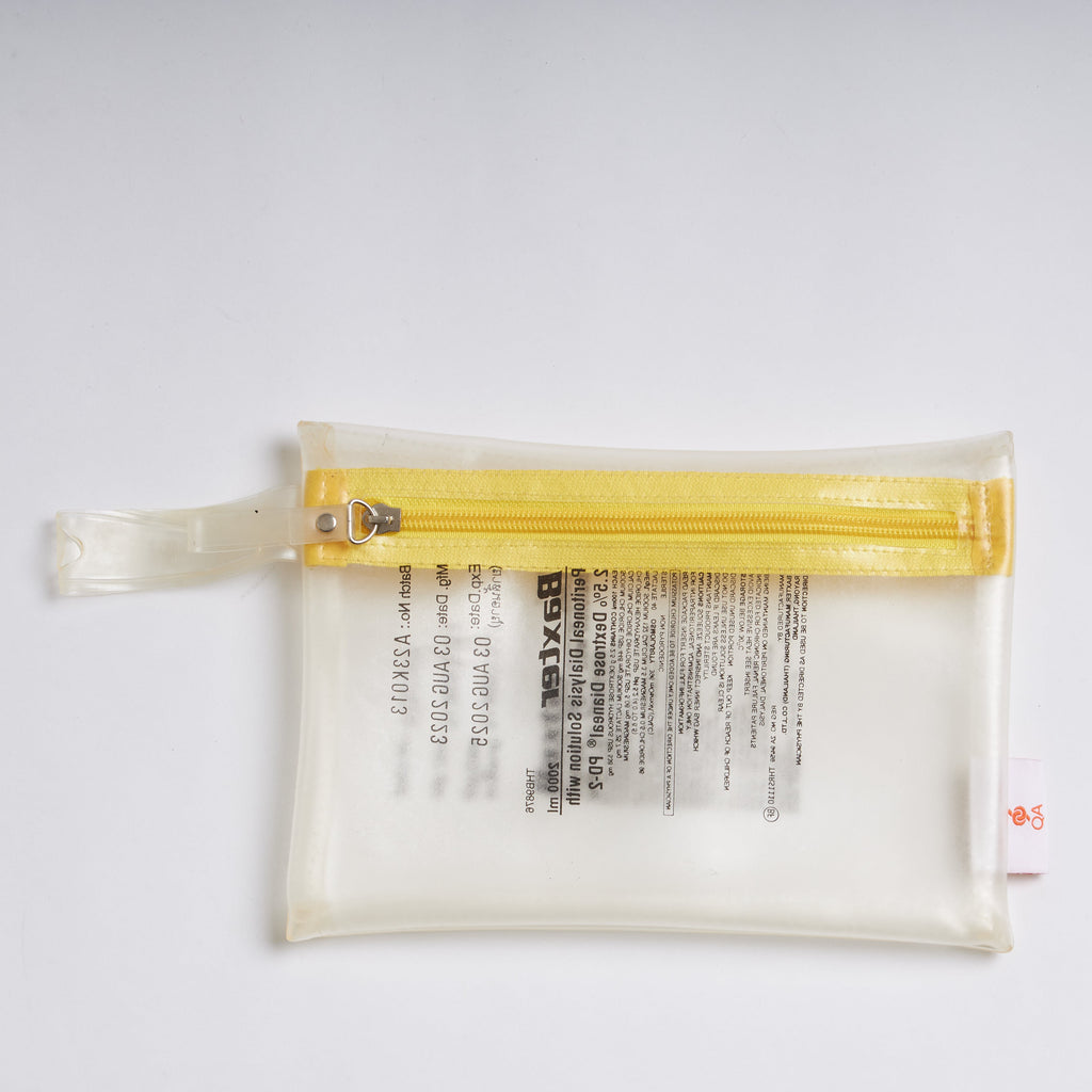 Sustainable handcraft and recycled pouch from Asia. The pouch is made of recycled dialysis bag and is sold online on www.qacrafts.com.