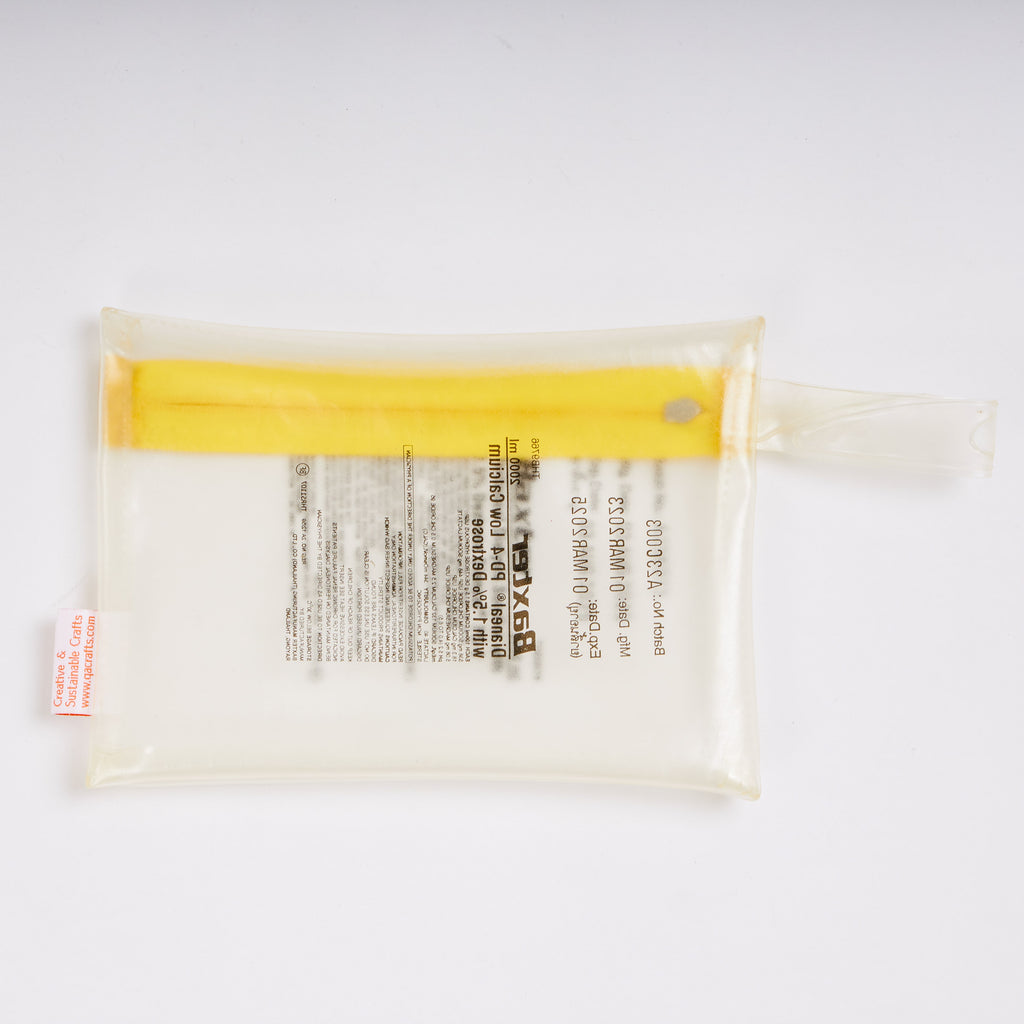 Sustainable handcraft and recycled pouch from Asia. The pouch is made of recycled dialysis bag and is sold online on www.qacrafts.com.