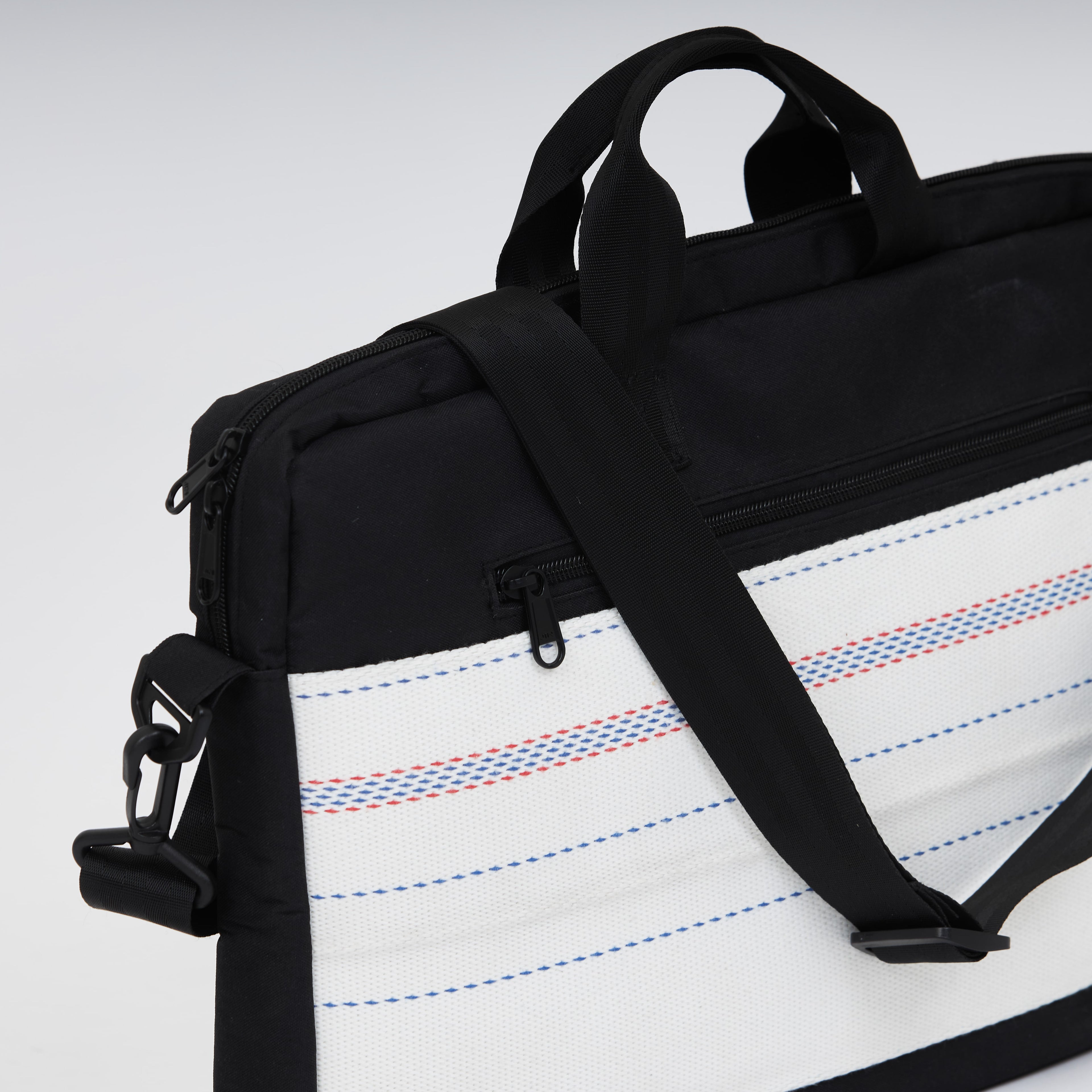 Handmade upcycled firehose bag and laptop bag. Sustainable and eco-friendly, we sell the bag on www.qacrafts.com