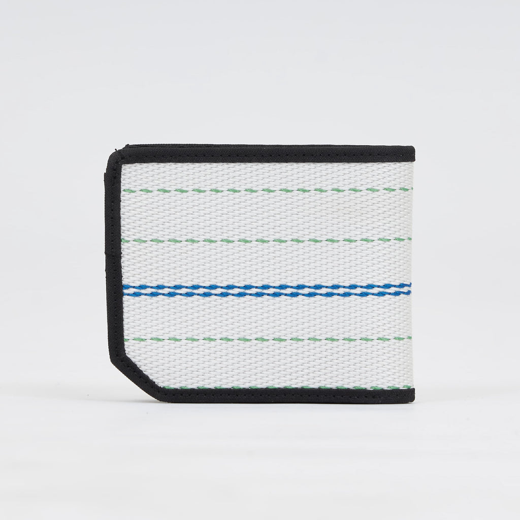Handmade sustainable and recycled firehose wallet. The wallet is made of recycled firehose and sold online on www.qacrafts.com.