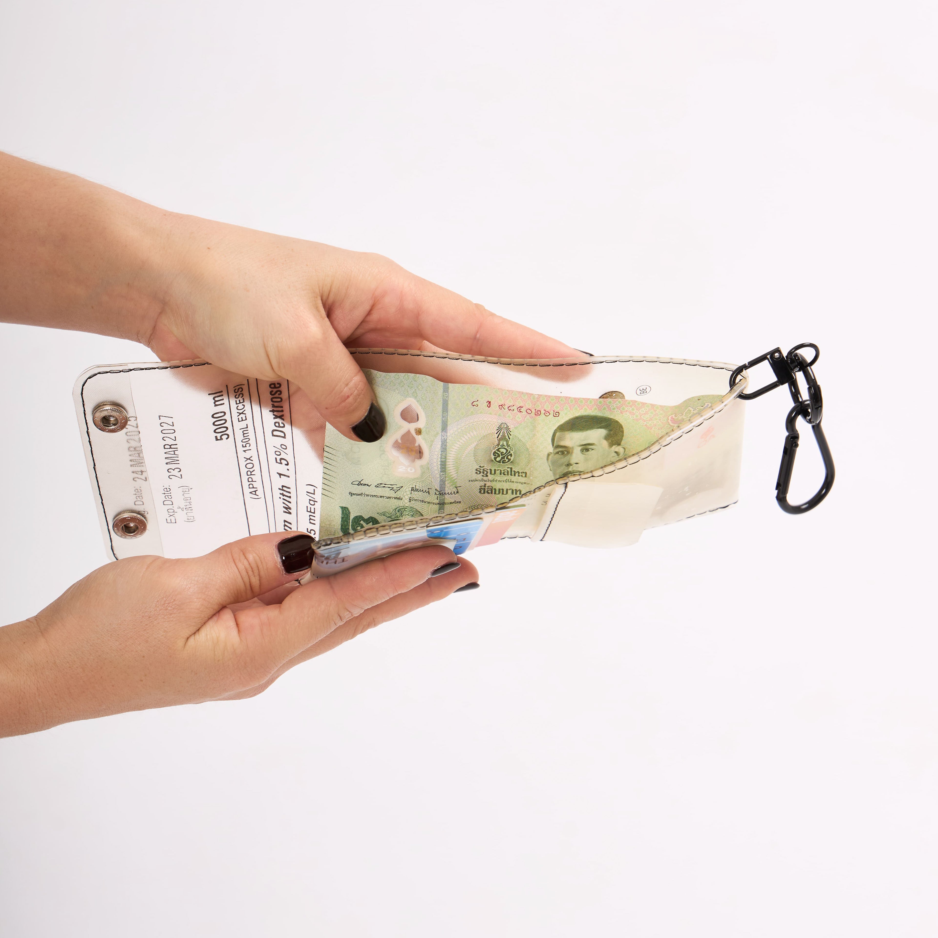 Eco-friendly wallet holding cash and cards