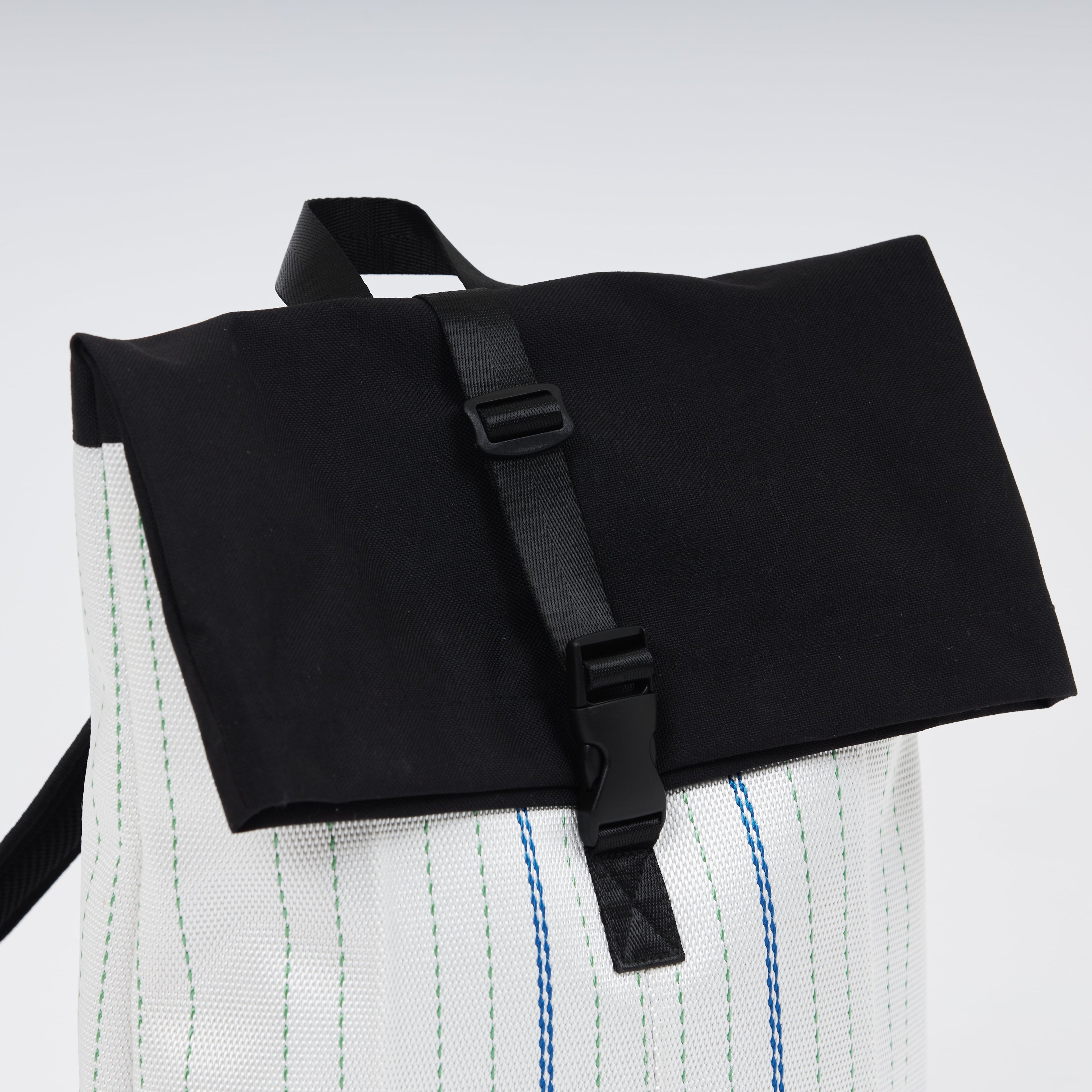 Backpack made of recycled firehose by hand. Sold on qacrafts.com