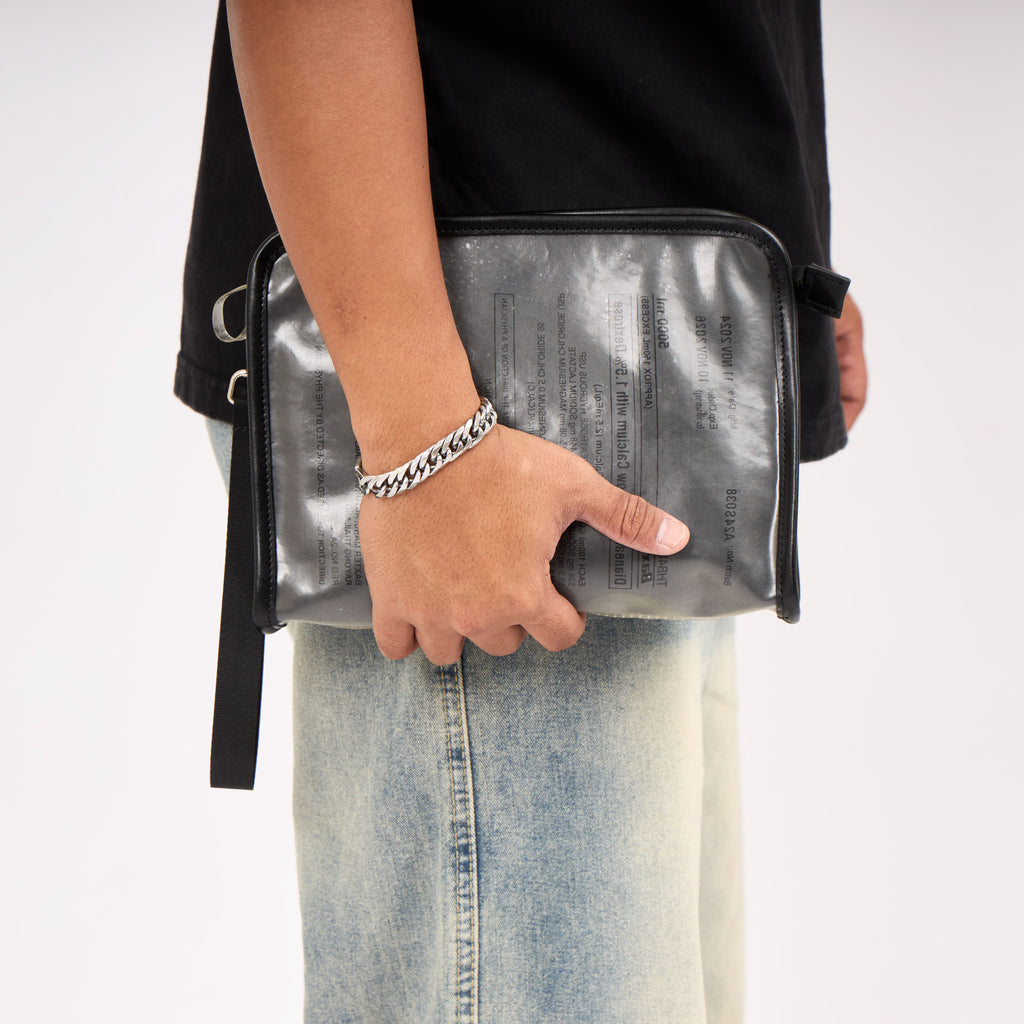 Dyophero lightweight sustainable pouch with wrist sling