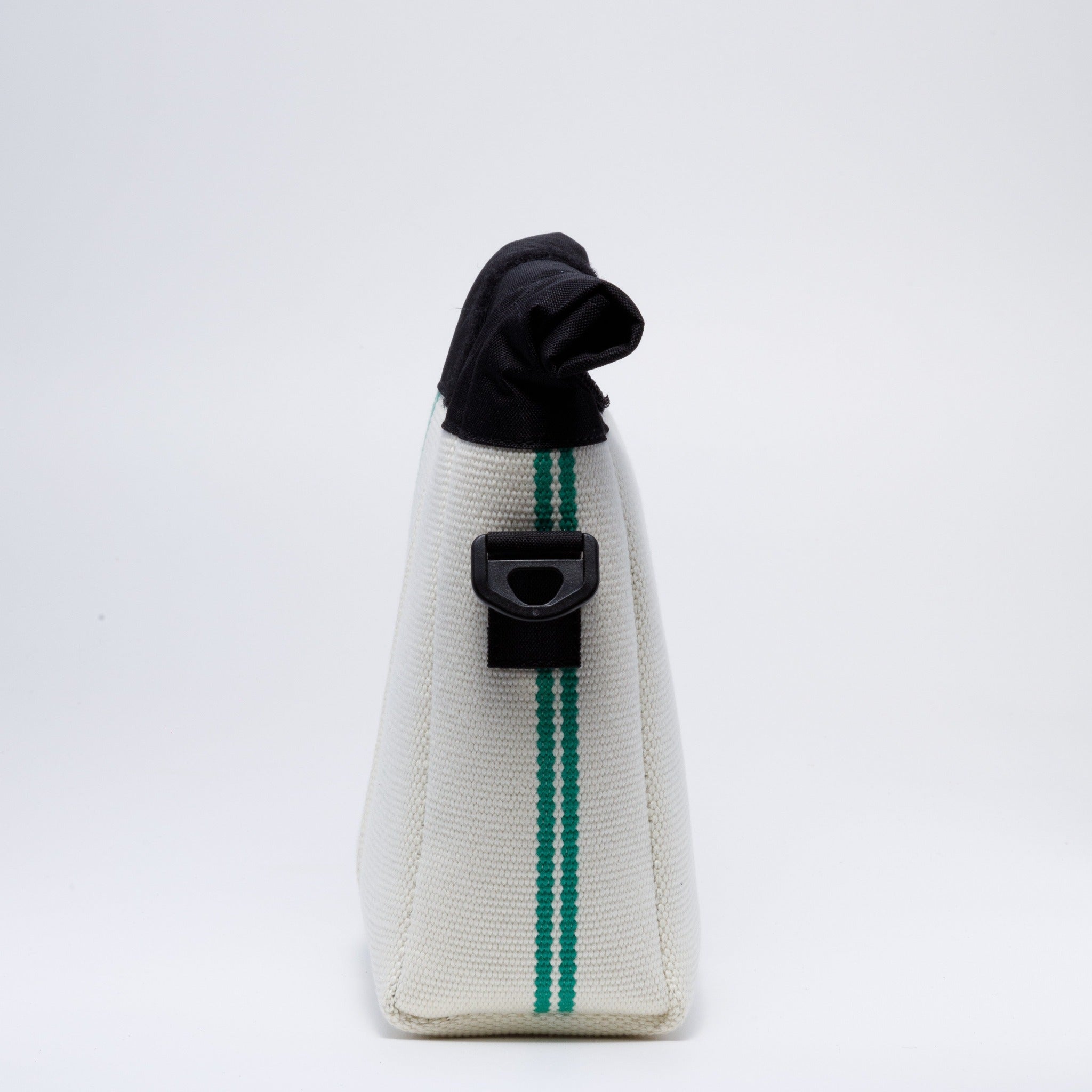Handicraft sustainable and recycled bag from Asia. The crossbody bag is made of recycled firehose and sold online on www.qacrafts.com. 