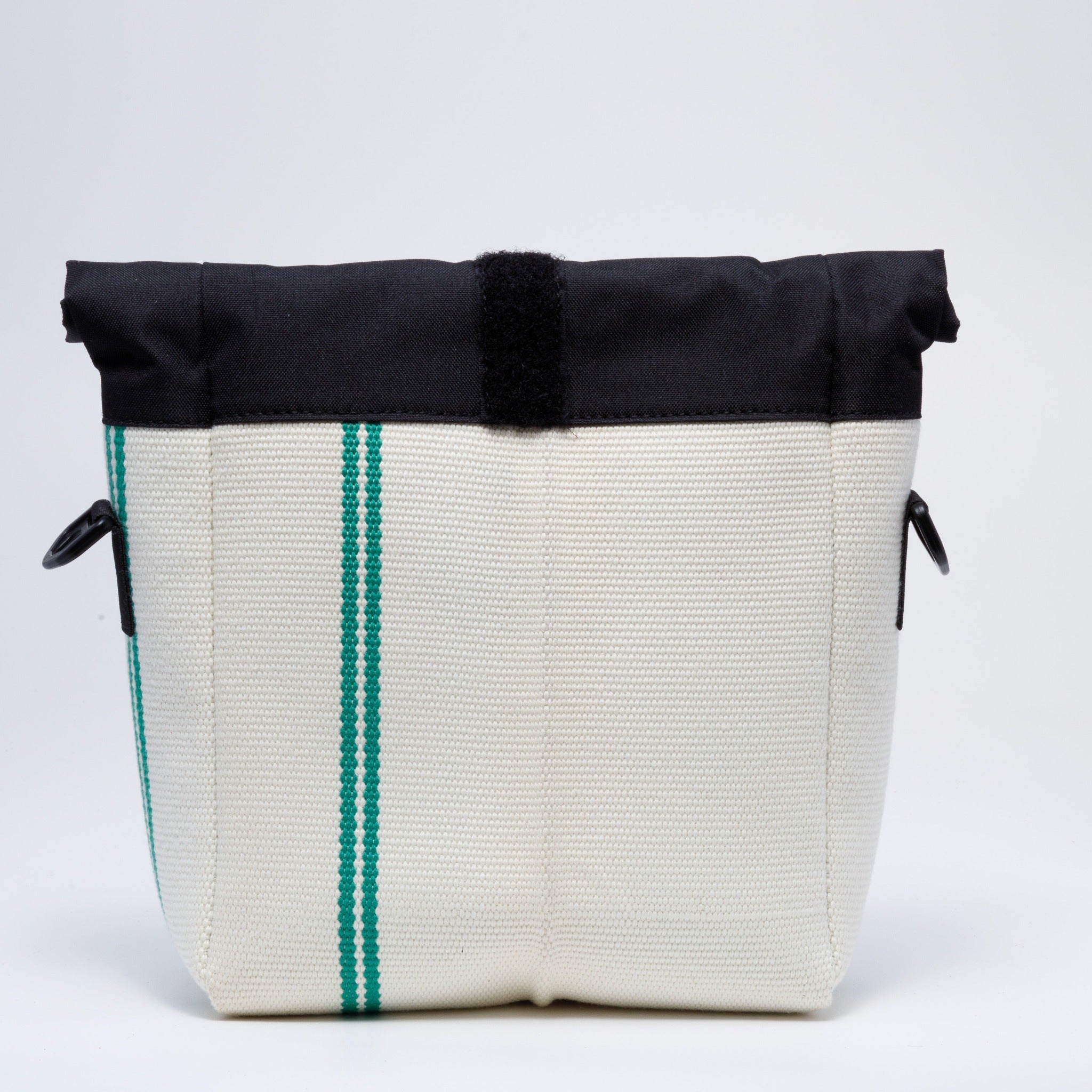 Handicraft sustainable and recycled bag from Asia. The crossbody bag is made of recycled firehose and sold online on www.qacrafts.com. 