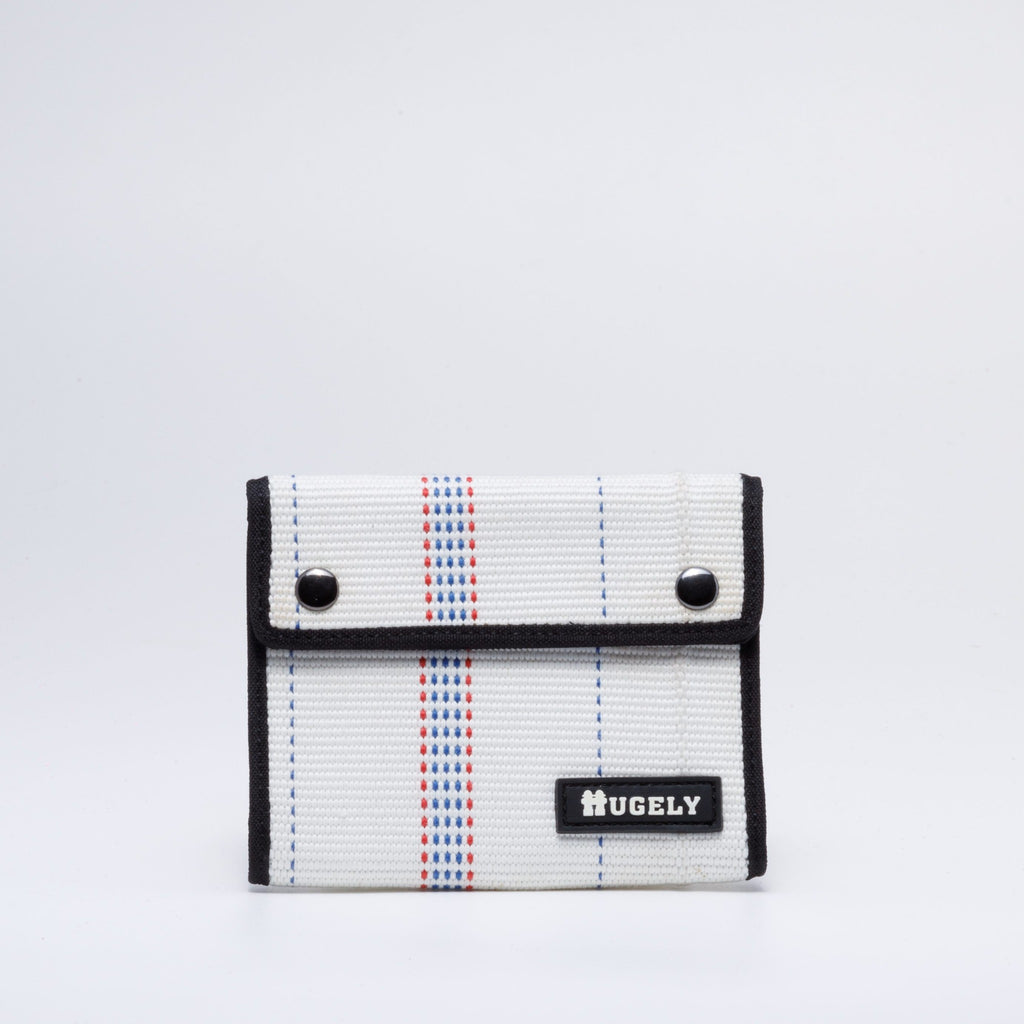 Handmade sustainable and recycled firehose wallet. The wallet is made of recycled firehose and sold online on www.qacrafts.com.